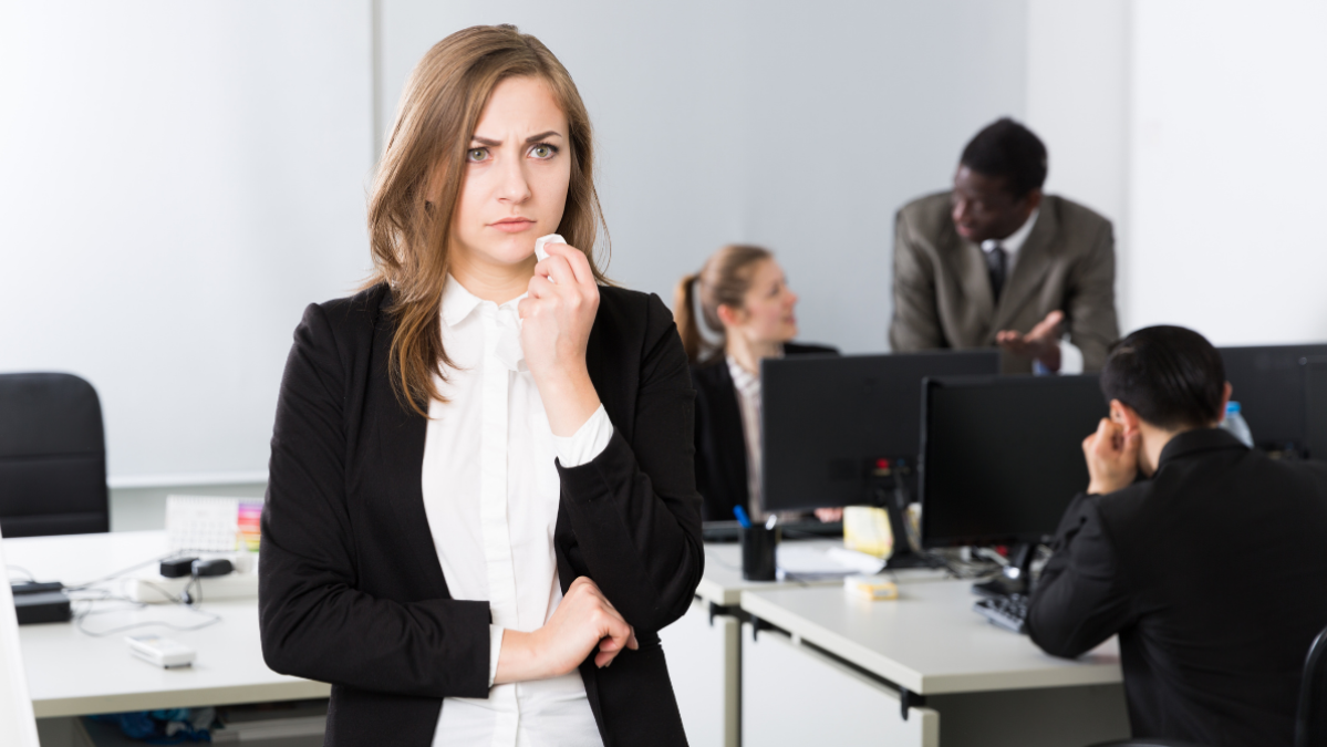 Woman looking worried at work